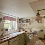 Antique White square wall tiles in the cottage kitchen of emilieinwiltshire
