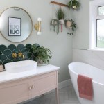 Soho So Emerald green scallop wall tiles behind the vanity unit in the bathroom of Rhiannon Sager featured in Good Homes Magazine
