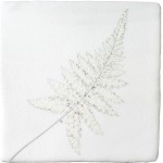 Cut out of a white square tile with an ornamental grass illustration in a charcoal style