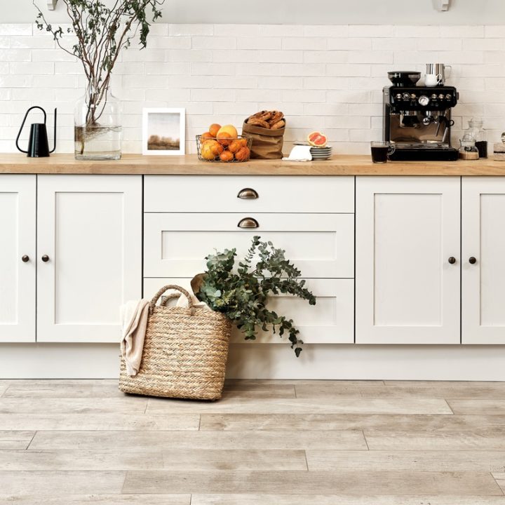 Our kennet collection paired with a white kitchen and our Weathered Oak porcelain tiles