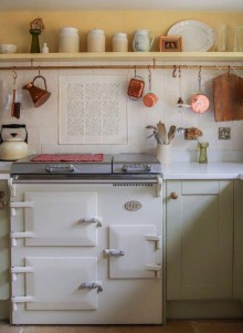 Handpainted Emma patterned wall tiles in the kitchen of designer Emma Diaz