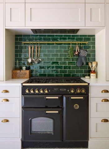 Soho So Emerald brick tiles behind a kitchen aga