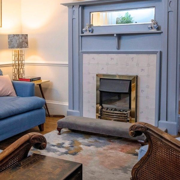 Amorini fireplace tiles in lounge designed by Morven Fitzpatrick