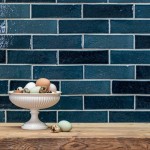 Isles Argyll 6x21cm skinny brick metro tiles in brickbond format on a wall with a bowl of eggs in front