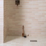 Isles Uist 7x21cm Skinny metro wall tiles on walk in shower floor and walls