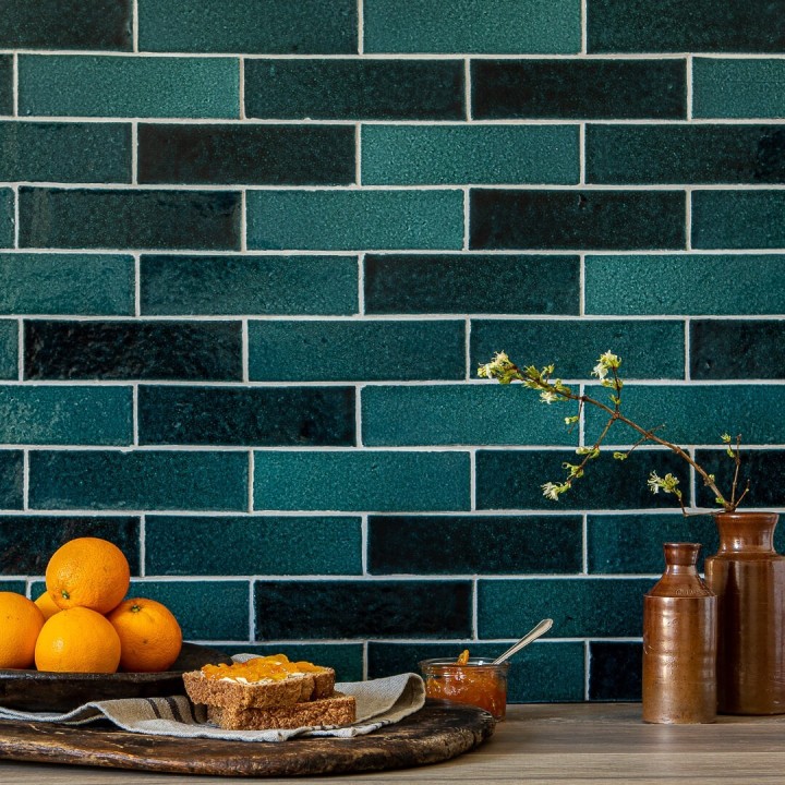 Isles Raasay 6cm x 21cm skinny metro brick tiles in brick bond layout with oranges and marmalade on toast in front