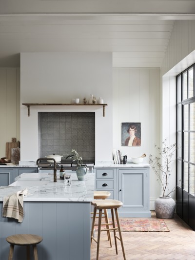 Tiles that complement a blue kitchen