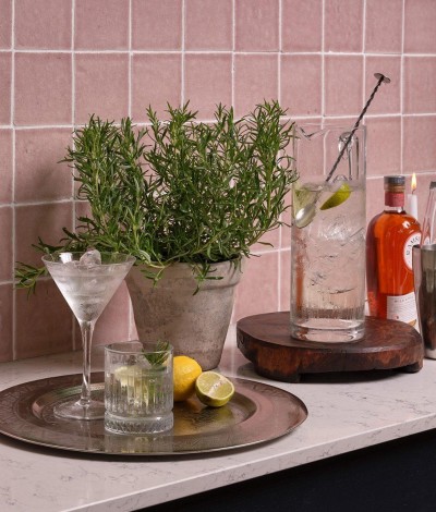 A pink gin collins with elderflower & rosemary