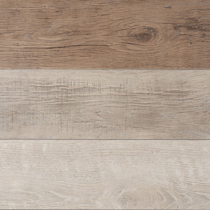 3 wood effect planks in three shades, a pale shade of wood in almond, a neutral shade of wood in honey and a darker shade of wood in biscuit