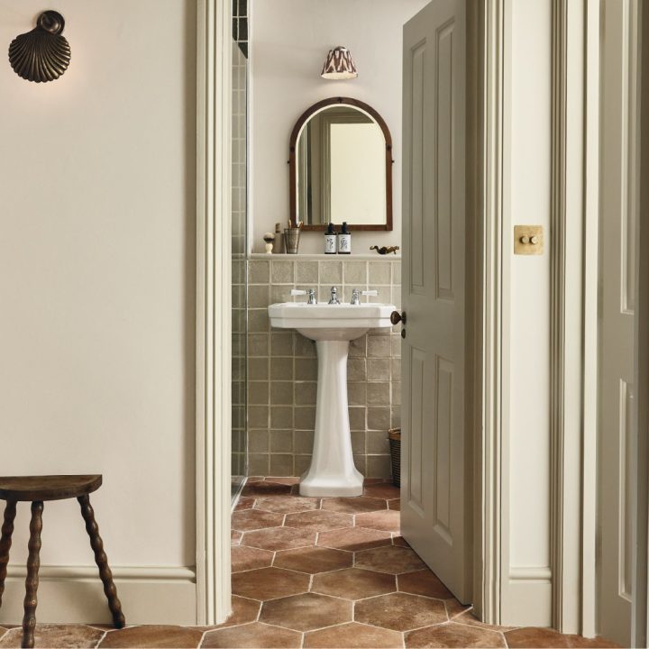 Harriet Howarth's hallway and bathroom renovation featuring handmade wall tiles from our Ullswater collection, beautifully complemented by terracotta-effect porcelain floor tiles from our Andalucia collection.﻿