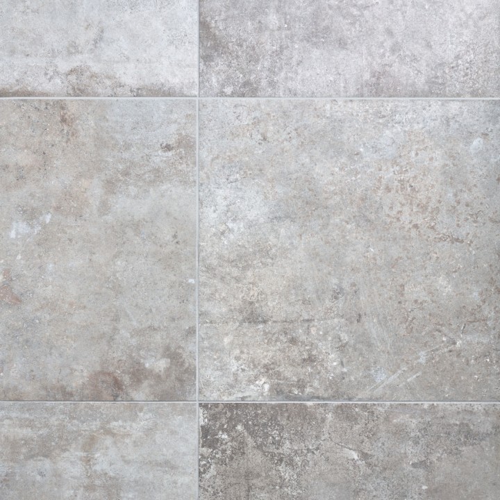 Floor of rectangle warm taupe stone effect porcelain floor tiled with grey grout