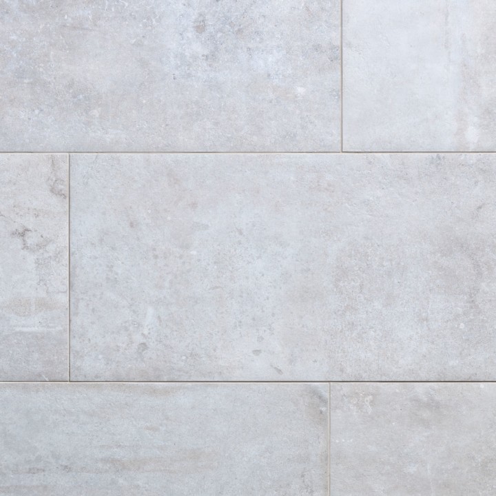 Floor of rectangle cool grey stone effect porcelain floor tile with grey grout
