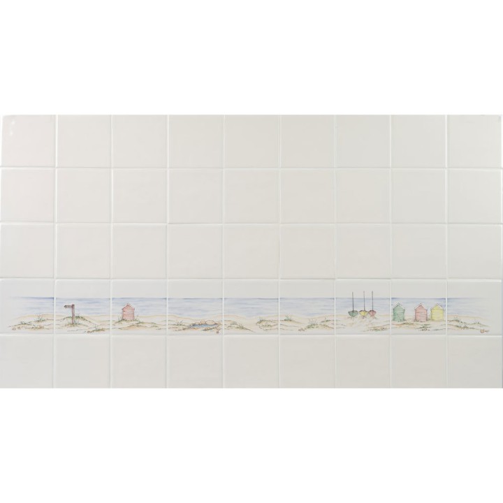 Wall of Hand painted bathroom beach square tile borders in a seaside style with sand and sea with beach huts and boats