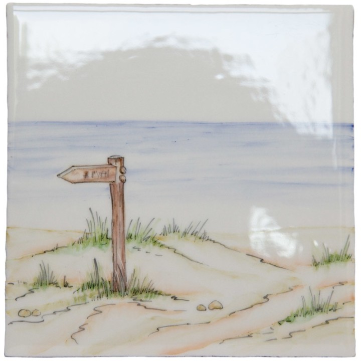 Hand painted bathroom beach square tile in a seaside style with sand and sea and a sign post