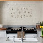 Wall of a botanical and floral tiled cooker splash back panel with butterfly, insects and ornamental grass tiles
