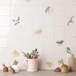 Wall of british wildlife animal square tiles, painted by hand against a wood worktop with vases in front