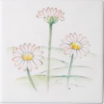 Cut out of hand painted daisy flower square tile with grass in the background