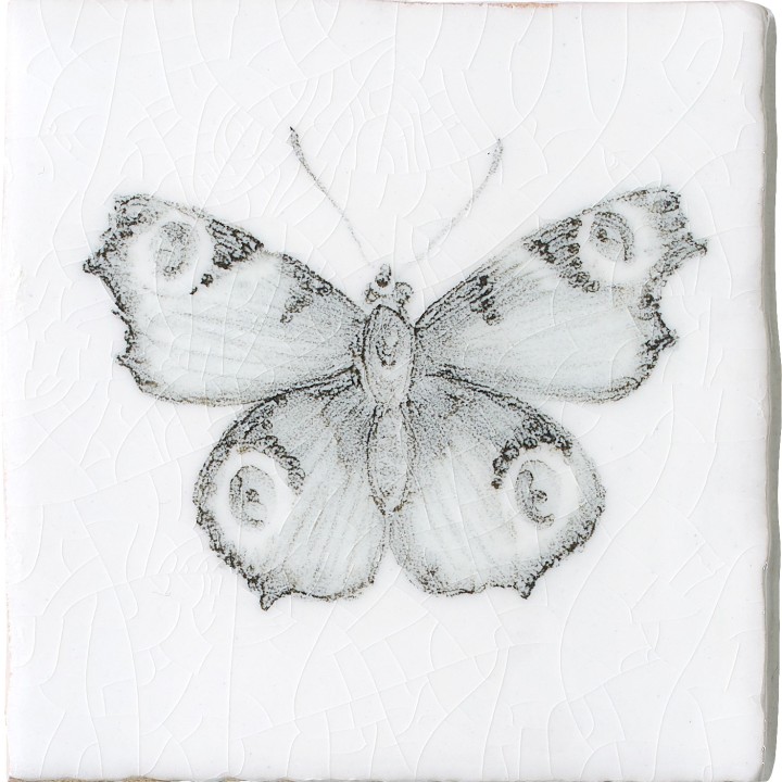 Cut out of a hand painted butterfly taco square tile in a charcoal etching style