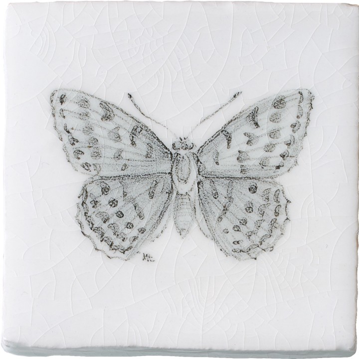 Cut out of a hand painted butterfly taco square tile in a charcoal etching style