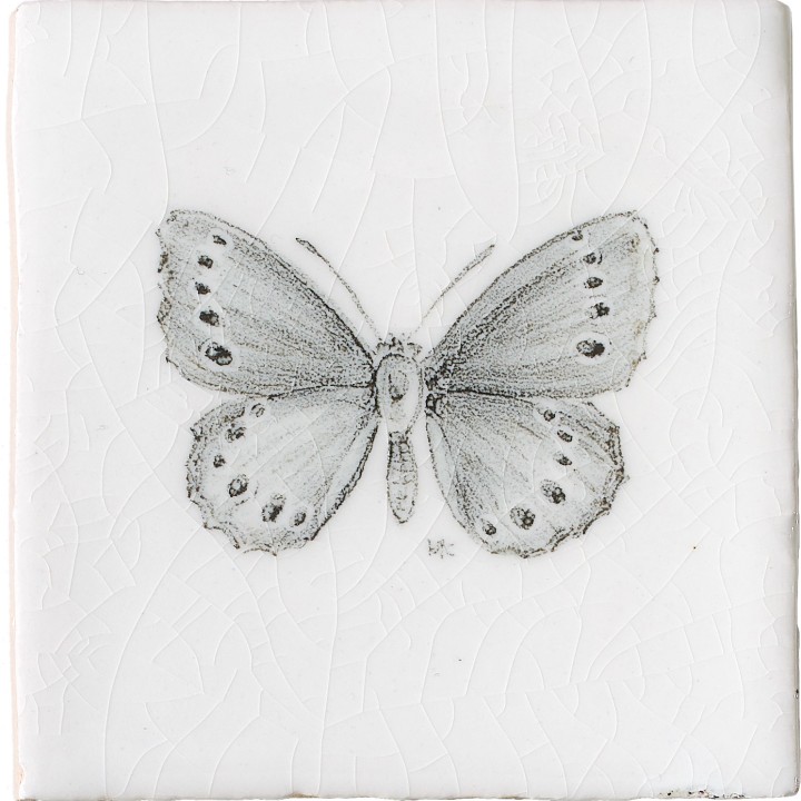 Cut out of a hand painted butterfly taco square tile in a charcoal etching style