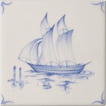 Cut out of a delft sailing boat square tile with the classic blue style with an ivory background and delft corners
