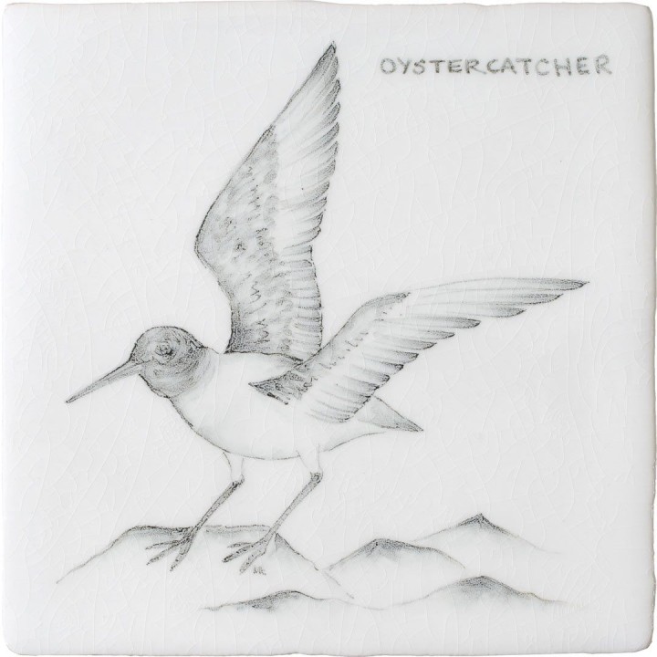 Cut out of a hand painted Oyster Catcher bird square tile in a classic charcoal style