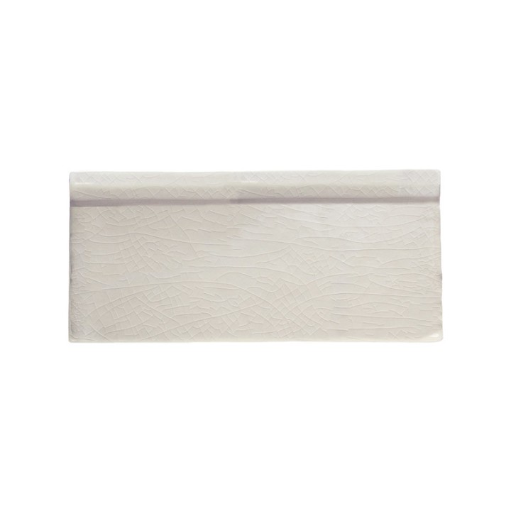 Cut out of frame border metro tile in antique white with a crackle glaze