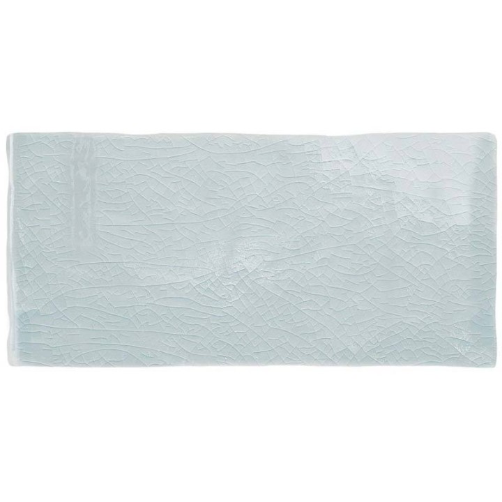 Cut out image of a duck egg blue glazed brick tile