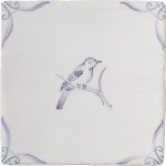 Cut out of a delft birds square tile with the classic blue style with an ivory background and ornate delft corners