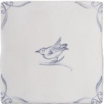 Cut out of a delft birds square tile with the classic blue style with an ivory background and ornate delft corners