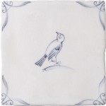 Cut out of a delft birds square tile with the classic blue style with an ivory background and ornate delft corners