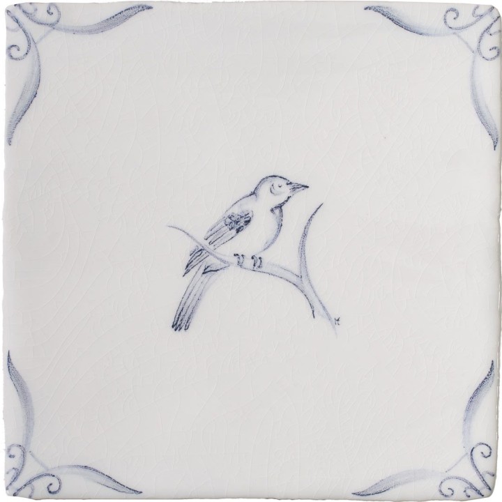 Cut out of a delft birds square tile with the classic blue style with an ivory background and ornate delft corners