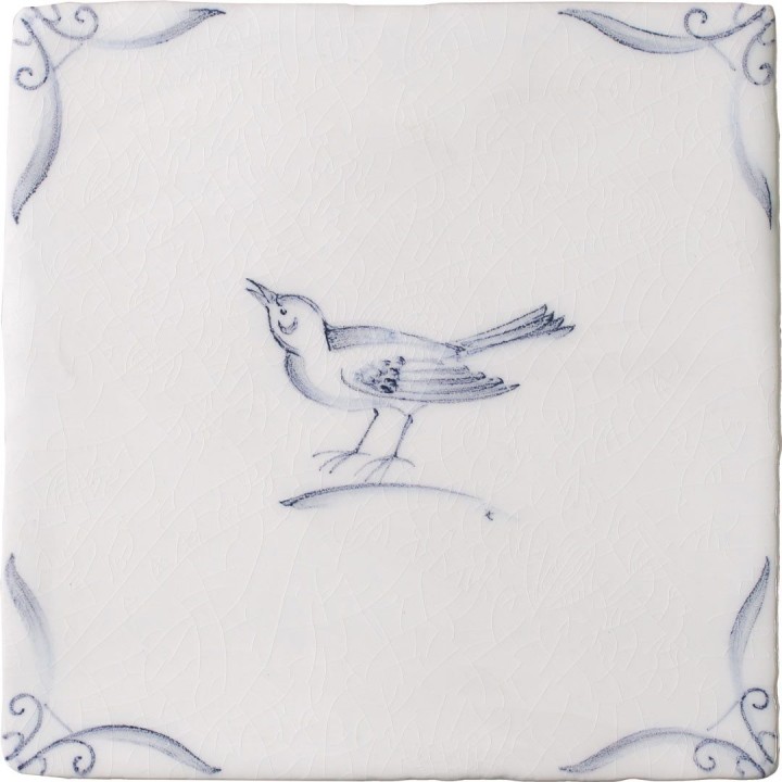 Cut out of a delft birds square tile with the classic blue style with an ivory background and ornate delft corners