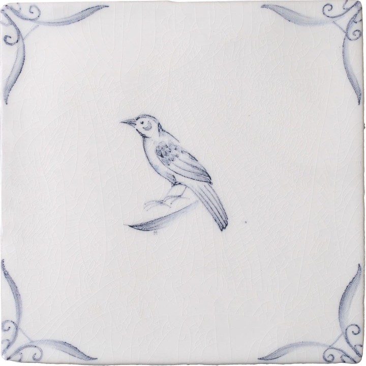 Cut out of a delft birds square tile with the classic blue style with an ivory background and ornate delft corners