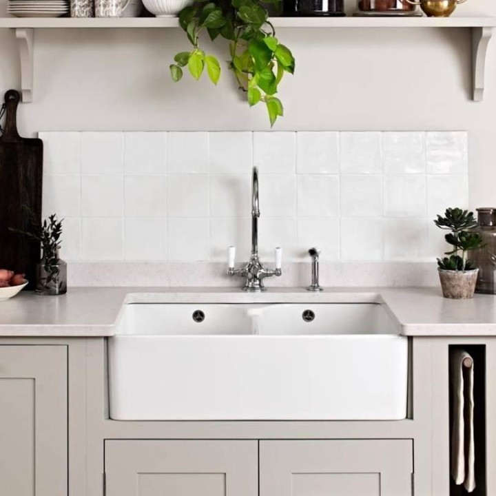 Elements Ivory handmade square wall tiles with white grout behind sink