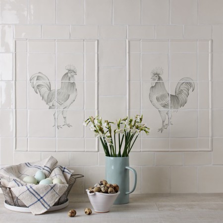 Tiled Cooker splashback of two 6 tile panels of two cockerels facing each other framed with tiled borders