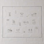 Wall of tiles with kitchenware and utensil illustrations in charcoal for a range cooker tile panel