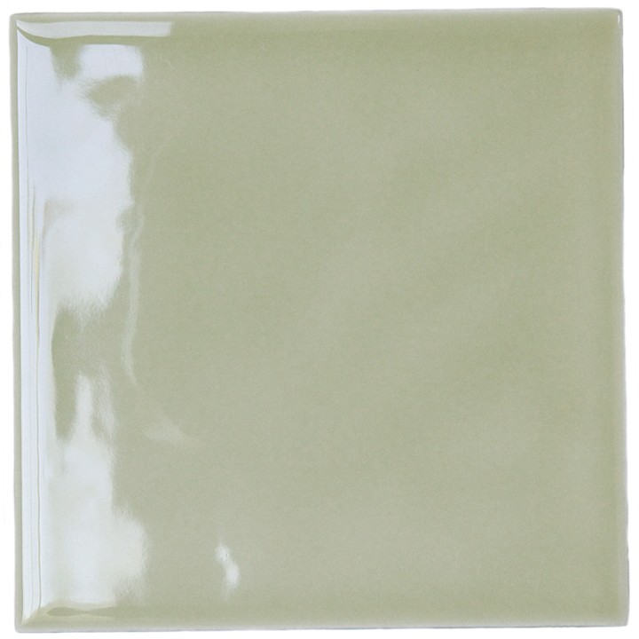 Cut out of a neutral green gloss square tile