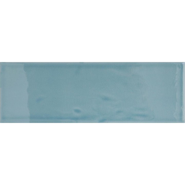 Cut out of a blue green gloss long metro brick tile