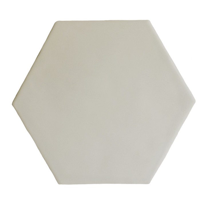 Cut out of a neutral green matt hexagon tile