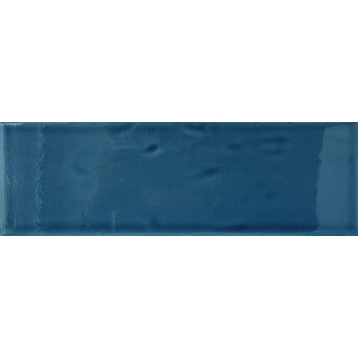 Cut out of a deep navy blue gloss long metro brick tile