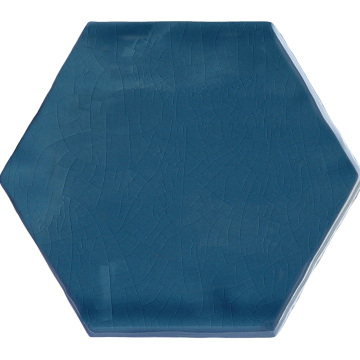 Cut out of a navy blue gloss hexagon tile