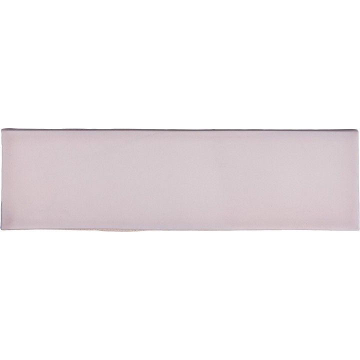 Cut out of a matt pale blush pink skinny metro tile