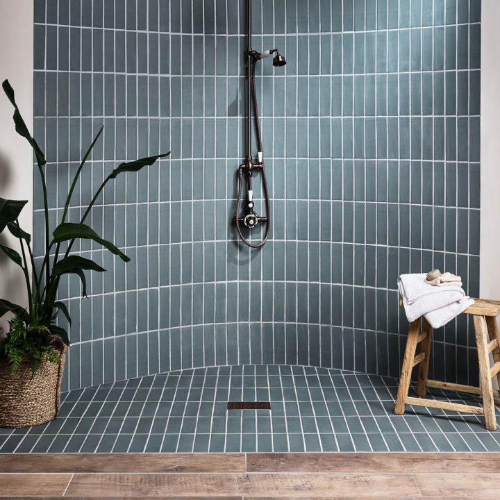 Our Matt Coldharbour Green skinny metro tile used to create a curved walk in shower
