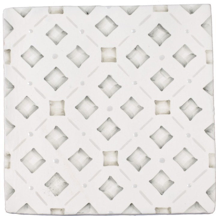 Cut out of a sage green square geometric pattern tile