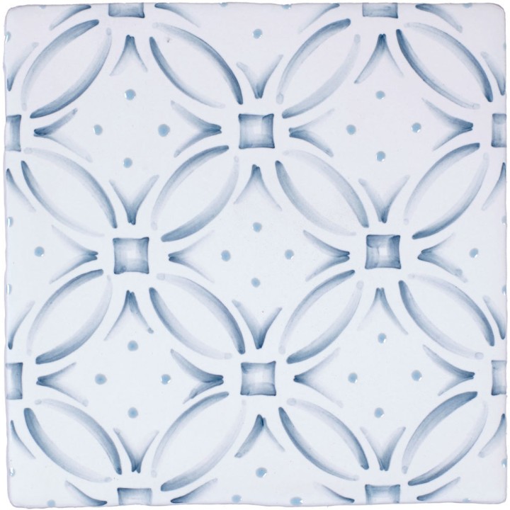 Cut out of a blue circular geometric pattern tile