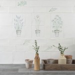 Wall of off white metro and square tiles with herb garden motifs from lavender to parsley