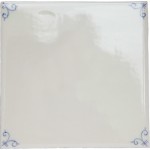 Cut out of an ivory square tile with hand painted delft corners