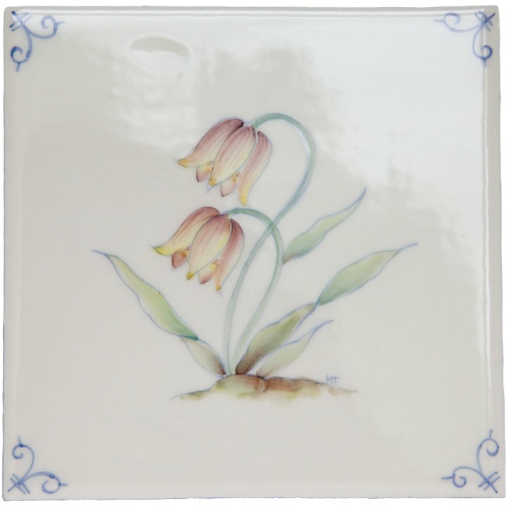 Cut out of an ivory square tile with hand painted yellow flower