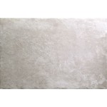Cut out of a large rectangle beige stone effect porcelain floor tile